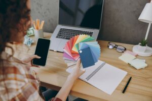 Image of a person painting an office space